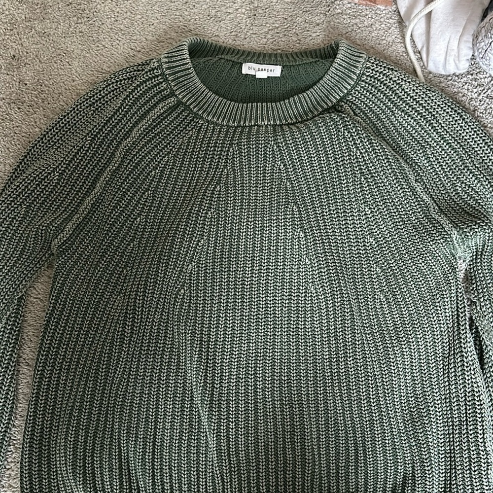 Green sweater, size large.
